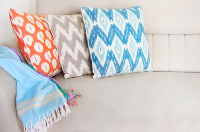 Cozy-living-room-with-pillows-on-boho-style-sofa